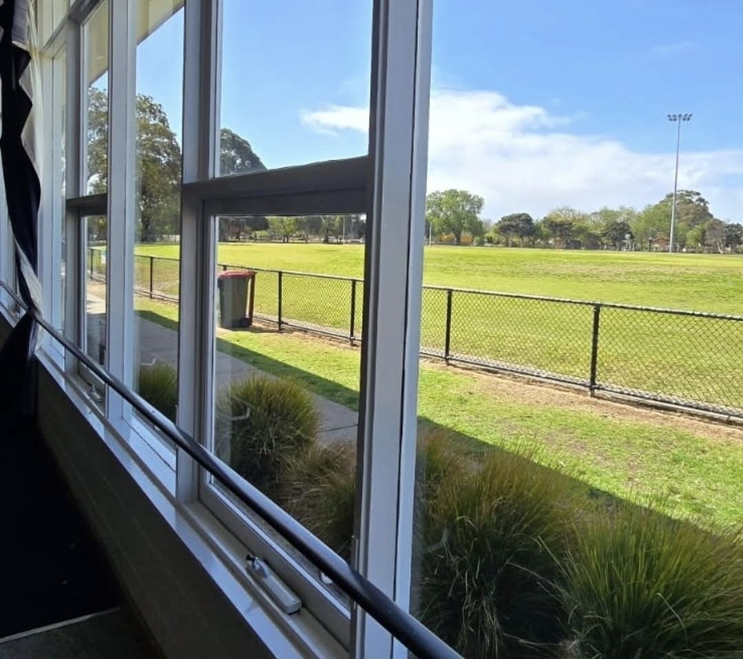 Community sporting clubroom at McKinnon with cleaned windows overlooking the oval
